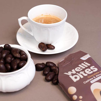 Dragees di noci, mandorle e anacardi ricoperte di cioccolato con prebiotici vegan Welli Bites