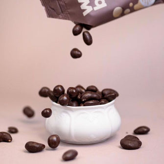 Dragees di noci, mandorle e anacardi ricoperte di cioccolato con prebiotici light Welli Bites
